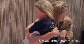 Incredible moment NHS worker reunited with daughters after 9 weeks apart