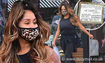 Nicole 'Snooki' Polizzi surprises shoppers waiting at curbside pick-up outside her NJ boutique