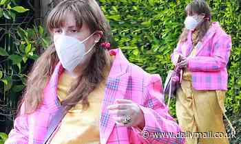 Lena Dunham makes a statement in yellow playsuit and pink plaid suit jacket as she steps out in LA