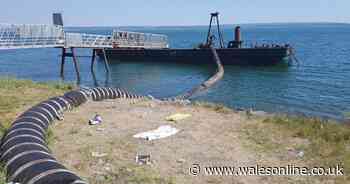 Forty teenagers found drinking and jumping off dredger in sea near Llanelli