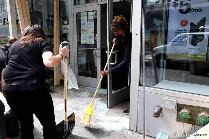 New York City picks up the pieces after night of unrest, curfew extended