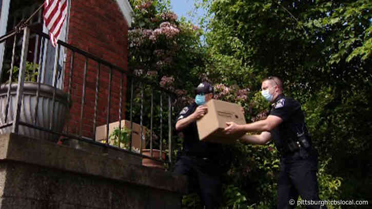 North Hills Community Outreach And Shaler Police Officers Deliver Food To Seniors