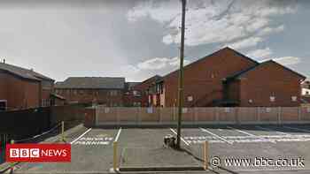 Man dies in St Helens flat fire 'caused by cigarette' - BBC News