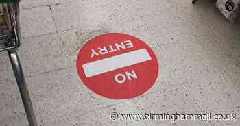 Asda steps up social distancing with road sign-style 'no entry' stickers