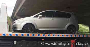 Police find TEN people crammed inside 'overweight' car on M5
