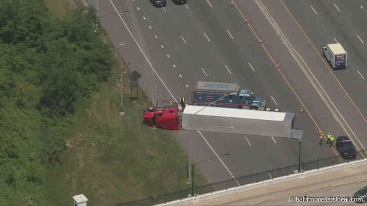 Crews Working On Hazmat Incident After Tractor Trailer Overturns On I-695