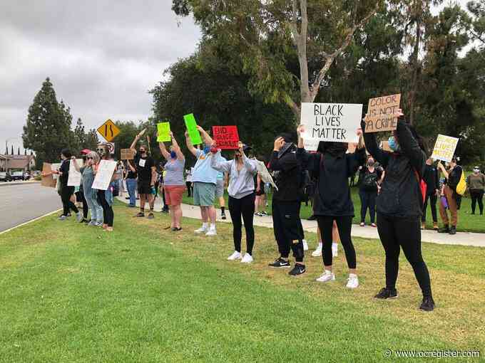 Fountain Valley demonstrators take a knee in George Floyd protest