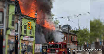 Toronto fire crews take down massive blaze at Queen and Sumach - blogTO
