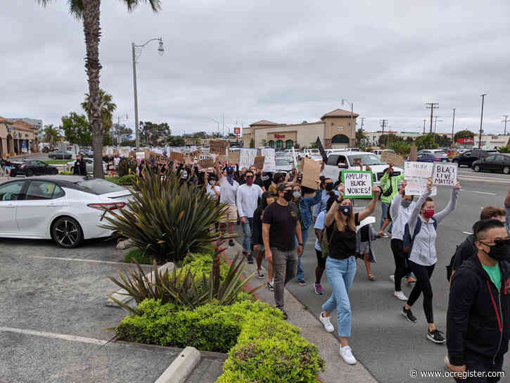 Hundreds march in Costa Mesa for George Floyd, protest police