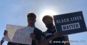 Gophers football players tackle a history of racism
