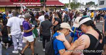 Crowd watching Floyd service from the street prays, mourns, hopes