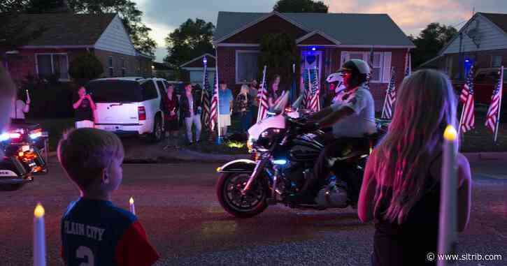 Crowds line Ogden streets Thursday during a police memorial procession honoring slain officer Nate Lyday