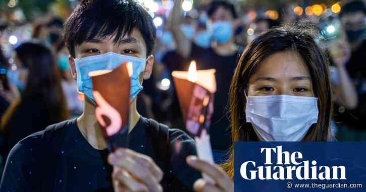Thousands in Hong Kong defy ban to hold Tiananmen Square vigil – video