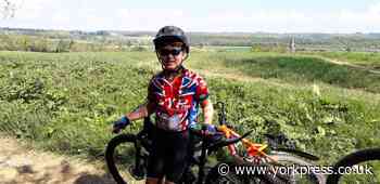 Young boy’s 700-mile challenge to help virus research