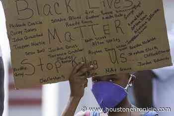 Tensions escalate but remain nonviolent after peaceful day of protests in Houston - Houston Chronicle