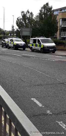 Pedestrian taken to hospital following crash