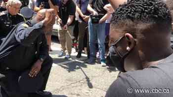 Demonstrators protesting anti-black racism in downtown Toronto Friday