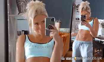 Love Island's Gabby Allen showcases her washboard abs in a tiny white crop top