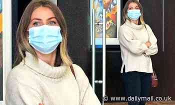 Julianne Hough bundles up in a sweater for first outing since separating from Brooks Laich