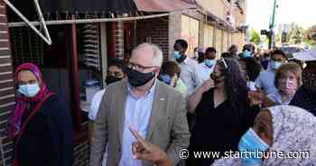 Gov. Tim Walz visits places hit by looting and vandalism