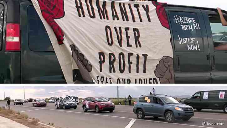 ‘Free Them All’ car rally draws dozens outside Eloy detention center