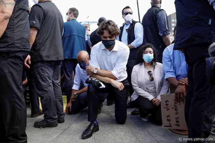 'Stand up to Trump!' Canada protesters shout to Trudeau who kneels at anti-racism rally