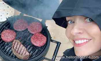 Holly Willoughby enjoys a 'classic British BBQ' – in the rain!