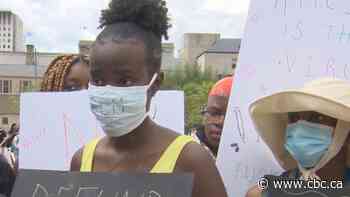 Demonstrators at Nathan Phillips Square protest anti-black racism