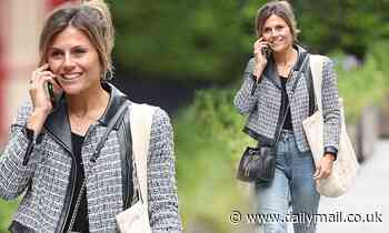 Zoe Hardman cuts an effortlessly chic figure in a tweed and leather jacket