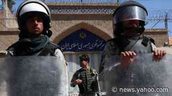 Afghans condemn Iran police after refugees die in car fire