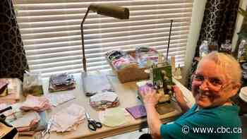 Retired seamstress sews masks to fight the pandemic and help feed animals in need