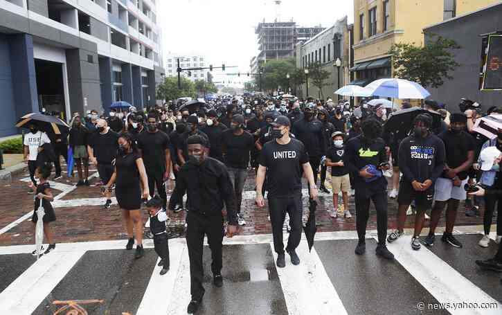 Largely peaceful protests against police brutality march on