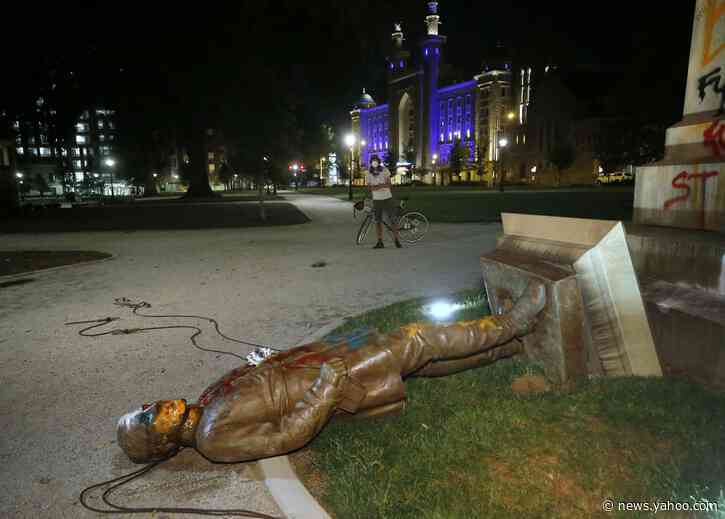 Protesters topple Confederate statue in Virginia capital