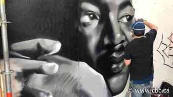 Artists transform Graffiti Alley with new murals in 'show of solidarity' with anti-racism movement