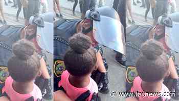 Houston cop seen comforting 5-year-old girl at George Floyd protest who asked: 'Are you gonna shoot us?' - Fox News