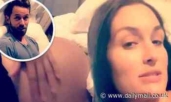 Nikki Bella puts her baby bump on full display in intimate video with fiancé Artem Chigvintsev