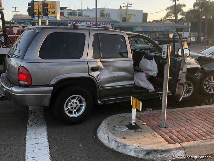 Seal Beach officer fires at suspect after being ‘intentionally struck’ by SUV, police say