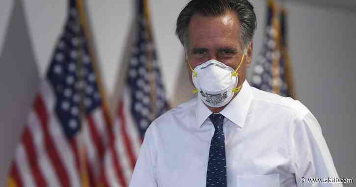 Mitt Romney marches in Black Lives Matters protest in Washington
