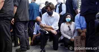 Justin Trudeau takes a knee at anti-Black racism protest in Ottawa - Global News