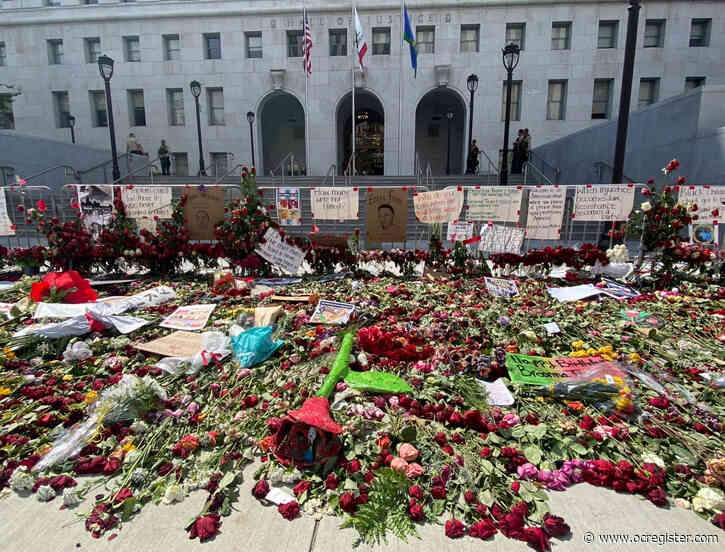 Southern California demonstrators join in car procession for George Floyd memorial service
