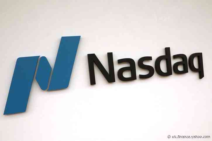 Nasdaq hits record high as U.S. recession becomes official