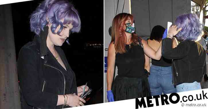 Kelly Osbourne has temperature checked as she grabs dinner out in LA after lockdown restrictions ease