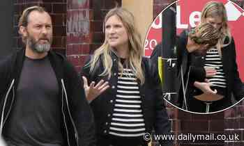 Jude Law, 47, and pregnant girlfriend, 32, walk in London