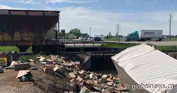 No injuries in collision between train and semi truck east of Lethbridge Friday morning - Globalnews.ca
