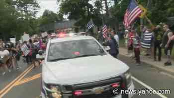 Protesters in Smithtown met by large group of counter protesters
