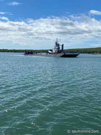 Coast Guard responding to report of aground barge in lower St. Marys River