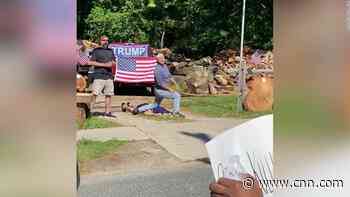 White men mock George Floyd's death as Black Lives Matter march goes by