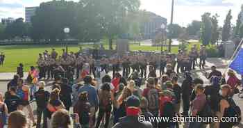 Protesters topple Columbus statue on Minnesota Capitol grounds