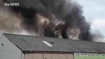 More than 60 fire fighters tackle huge fire at Bolton industrial estate - ITV News