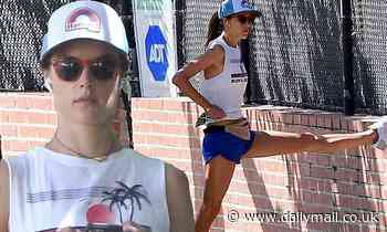 Alessandra Ambrosio showcases her toned supermodel legs while out for a jog in short-shorts
